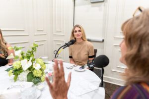 Lauren Bercier, Co-Founder & CEO of Something Borrowed Blooms with one of her silk flower centerpieces. Her rental flowers only look real but her company is growing for real