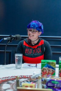 Cyn Speer Sanders (aka Original Cyn) is a skater and trainer at Red Stick Roller Derby. Although that's a voluntary position, Cyn is a professional roller derby coach, training competitirs across the country and around the world